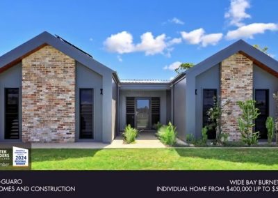 Grey home with two brick gables, captioned The Sa-Guaro, Wide Bay Burnett 2024, Individual Home from $400,000 up to $550,000